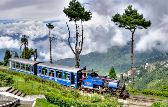 Toy train passes through the foothills of Darjeeling
